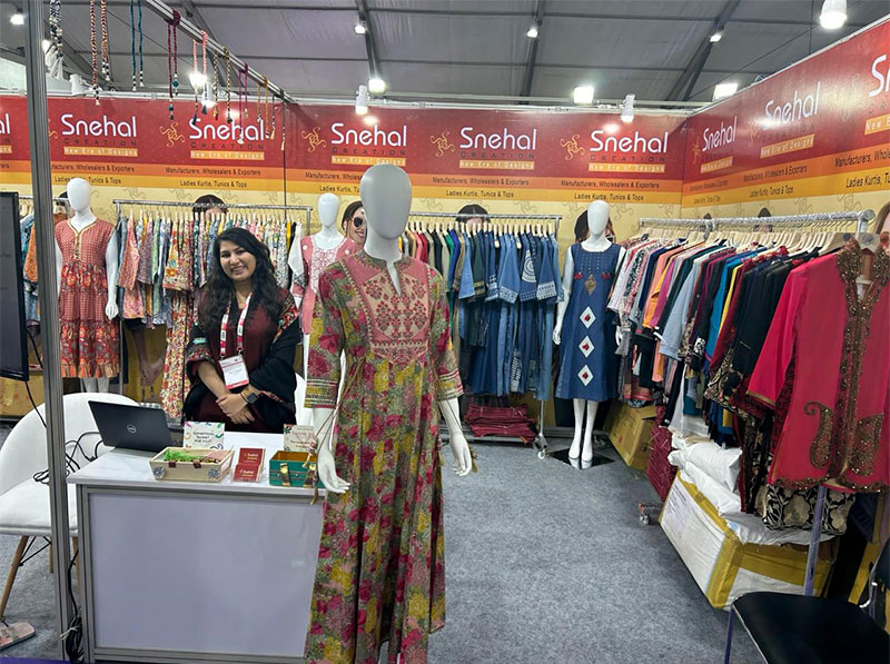 Snehal Creation team welcoming buyers at Bharat Tex 2024, New Delhi