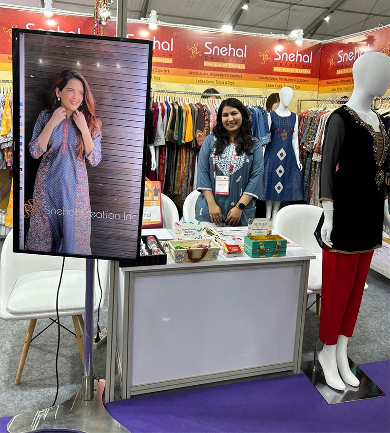 Snehal Creation booth (Stall H9A:032) at Bharat Tex 2024, New Delhi, with ladies kurtis on display