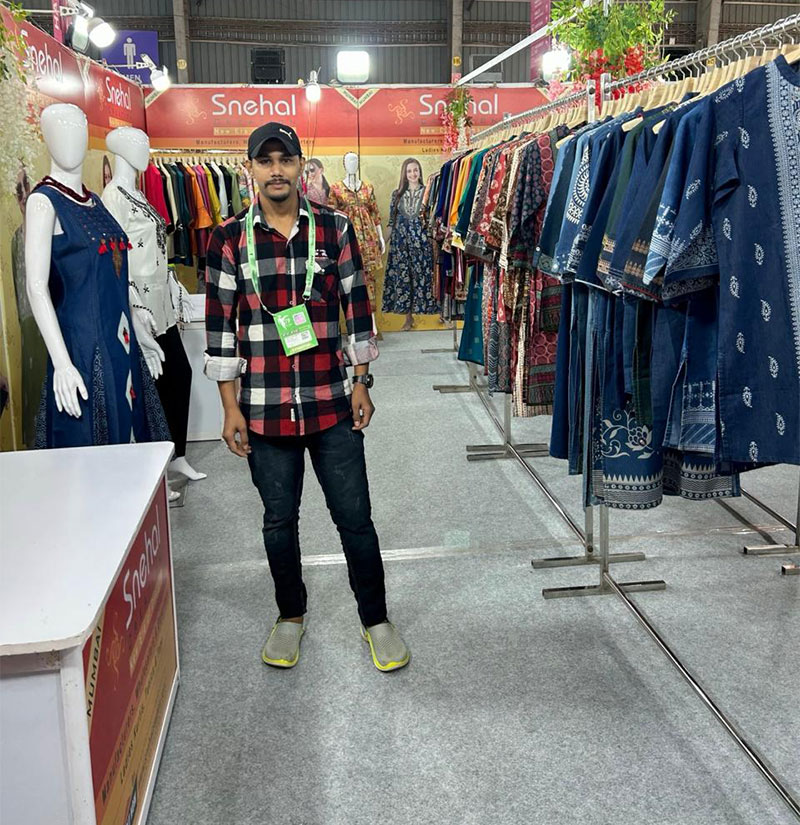 Buyers exploring Snehal Creation kurti collection at CMAI National Garment Fair 2024, Mumbai