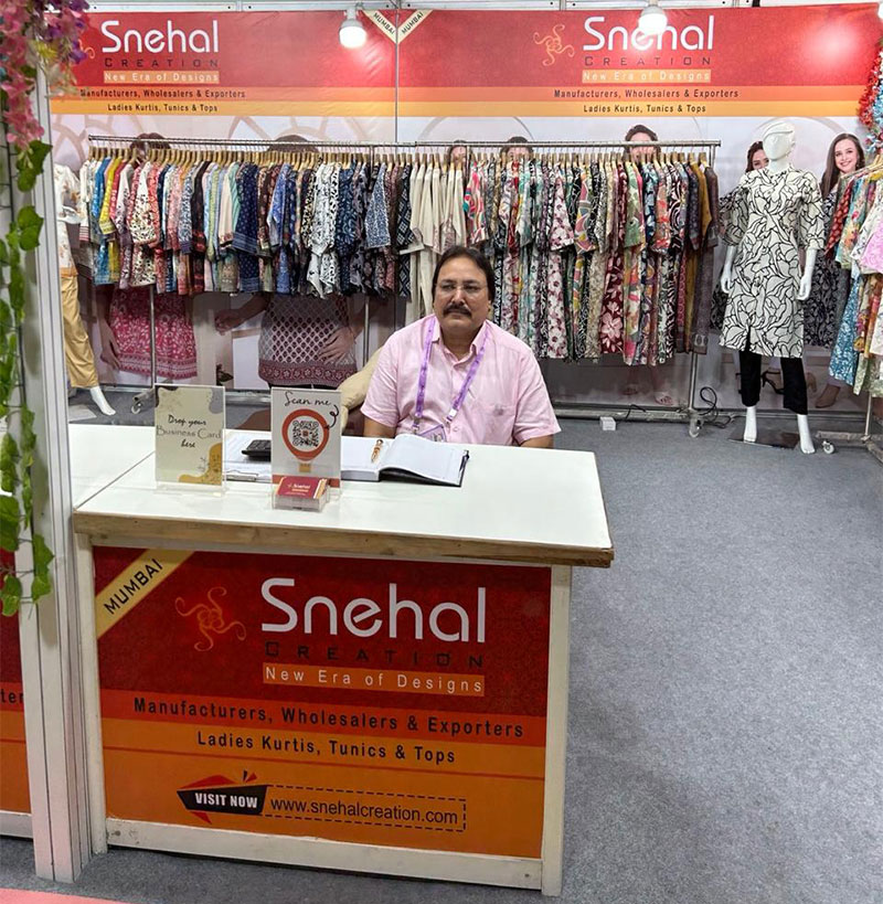 Snehal Creation founder meeting retailers at CMAI 81st Garment Fair, Mumbai 2025